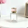 Botella de Perfume de Vidrio de Alta Gama 30ml 50ml Botella con Atomizador Reutilizable Rellenable Exquisita Botella de Fragancia Portátil con Tapa de Madera