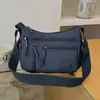 Bolso cuadrado pequeño informal de moda estilo coreano, con múltiples bolsillos y gran capacidad, versátil para viajes y compras, se puede llevar al hombro o cruzado.