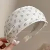 Diadema vintage de lunares plisada de ala ancha para mujer, casual y única, con un toque de alta gama, diadema versátil que hace que la cabeza se vea más alta y el rostro parezca más pequeño
