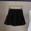[BiZheng] Nueva Falda de Línea A Adelgazante Estilo Coreano Primavera/Verano 2026 Falda Abullonada para Mujer Falda de Botón de Flor 5981
