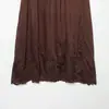 Ropa de Mujer al por Mayor Transfronteriza Estilo Europeo y Americano Verano 2026 Nueva Moda Color Sólido Bordado Hueco Falda de Línea A Versátil