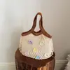 Bolsa fresca de estilo coreano con diseño calado para mujer, nueva moda 2026, bolsa de compras versátil, bolsa de mano casual ligera, bolsa de playa