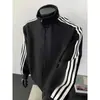 Jaqueta esportiva retro listrada color block com gola alta para homens, moletom jovem moderno estilo americano, peça externa casual