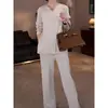 Nuevo traje de punto de cuello en V transfronterizo europeo y americano para mujer, conjunto de dos piezas de pantalones anchos casuales holgados de otoño e invierno, suéter de color liso para mujer