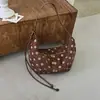 Nova bolsa de bolinhas estilo coreano 2026, grande capacidade, retrô, moderna, casual, estilosa e adequada para o trabalho, uma bolsa de ombro da moda