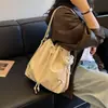 Bolsa Nueva de Gran Capacidad, Mochila Sencilla, Bolso Cubo Casual, Bolso de Hombro Único con Cordón para Commuter de Mujer, Estilo Coreano 2026