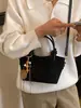 Bolso de hombro casual de nicho simple y elegante transfronterizo, nuevo bolso de mano popular estilo coreano otoño 2026, bolso de moda