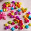Atacado de fábrica 7*10mm cor acrílico flor furo seis flor diy material acessórios de cabelo infantil