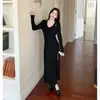 Comércio Exterior Roupas Femininas Foto Real Francês Cor Pura Torção Decote V Longo Vestido de Tricô Slim Elegante Base de Tricô Longa