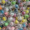 32mm bola de huevo retorcida totalmente transparente boutique juguete para niños máquina de juegos regalo dibujos animados máquina de huevos retorcidos de un yuan pequeño regalo