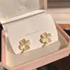 Pendientes de Plata de Ley S925 Ojo de Gato Trébol de Cuatro Hojas Pendientes Pequeños Frescos de Verano Pendientes de Nicho de Alta Gama Nuevos y de Moda para Mujer