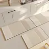 Alfombrilla especial para suelo de cocina japonesa 2024 nuevo estilo crema lodo de diatomeas antideslizante impermeable y a prueba de aceite alfombra larga