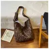 Venta al por mayor transfronteriza de bolsos tote grandes de moda con estampado de leopardo, estilo retro nuevo, de alta capacidad, versátiles para el trabajo y bolsos de hombro modernos para mujer