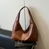 Bolsa de ombro de cor sólida estilo vintage, nova bolsa tote tendência verão 2026 versão coreana, bolsa de ombro casual de grande capacidade