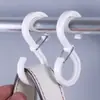 Gancho en forma de S creativo al por mayor gancho para abrigos hebilla a prueba de viento gancho S gancho gancho adhesivo dormitorio gancho de plástico sin rastro transfronterizo