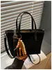 2026 Nuevo Bolso Tote de Moda Estilo Coreano Nicho Retro Bolso Cubo Versátil de Alta Gama para Uso Diario de Hombro Único o de Mano
