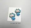 Acessórios de Pingente de Resina Doraemon Fofo em Estoque Acessórios de Cabelo Capa de Celular Decorações para Copos Chaveiro Ímã de Geladeira