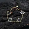 Pulsera Cruzada de Hip-Hop Europeo y Americano de Acero Inoxidable con Trébol de Cuatro Hojas para Mujer Cadena en Forma de O Joyería de Acero de Titanio Joyería de Diseño de Nicho Personalización de Joyería