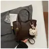 2026 Nova Moda Estilo Coreano Bolsa de Mão Couro Macio de Alta Qualidade Bolsa de Ombro Tipo Saco Estilosa Versátil Bolsa Transversal para Mulheres