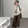 Pantalones casuales para niñas de otoño e invierno 2026 nueva moda estilo coreano sueltos de pierna ancha largos para niñas, estilo transfronterizo moderno