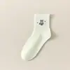 Meias de desenho animado para mulheres, meias de cano médio para primavera e outono, meias de algodão absorventes de suor e resistentes a odores, meias femininas fofas, meias longas brancas sem costura para senhoras