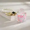Garrafa de areia movediça de celebridade da internet criativa com contas coloridas em um pingente de garrafa de óleo acrílico chaveiro pingente bolsa pequenos acessórios atacado