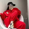 Conjunto esportivo casual de moda de celebridade da internet feminino 2026 primavera e outono novo moletom solto que emagrece com temperamento e calça longa conjunto de duas peças