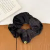Goma para el pelo floral marrón, elegante y a la moda, con diseño de cuadros para mujer, nuevo estilo 2026, accesorio para el pelo de tela de alta calidad