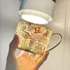 Ouge H Home Serie Leopardo Amarillo Vajilla de Porcelana Hueso Juego de Café Plato Occidental para el Hogar Taza de Café Platillo Tetera Fabricante Venta al por Mayor