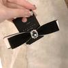 Coreia do Sul Dongdaemun retro strass Chanel estilo dupla camada arco mola clipe elegante preto e branco contraste cor grampo de cabelo superior