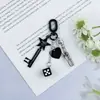Nuevo Colgante Creativo Versátil para Llavero Estilo Coreano con Dados, Estrellas, Llaves, Corazones y Accesorios de Aleación Multielemento