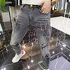 Pantalones vaqueros gruesos con forro polar para hombre, marca de moda europea, elásticos, ajustados, con estampado distintivo, negros, largos y modernos.