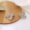 Pendientes de mariposa estilo retro de Hong Kong con aguja de plata S925, pequeños y brillantes pendientes de diamantes de imitación, nuevos pendientes de hada súper temperamento para mujer