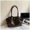 Bolsos de nicho coreanos, bolso tipo cubo de alta gama para mujer de gran capacidad, bolso de hombro simple vintage, bolso de moda para el antebrazo