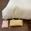 Bolsa de axila popular de nicho de verano con lunares dulces para mujer, nuevo bolso de hombro versátil 2026, bolso baguette versátil para el día a día