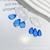 Populares en Europa y América, accesorios de joyería acrílica tipo flor de concha artificial para hacer tú mismo, accesorios creativos de colgante de nube blanca adecuados para collares y pendientes