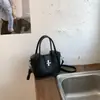 Bolso nuevo de alta gama para mujer 2026 transfronterizo, bolso de mano tipo cesta, bolso tipo cubo, bolso de hombro y cruzado versátil y de moda