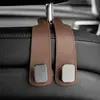 Venta Directa de Fábrica Gancho para Soporte de Teléfono Móvil en el Respaldo del Asiento del Coche Gancho Oculto para el Interior del Coche de Piel Sintética Aleación de Zinc