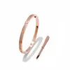 [02] Comercio exterior al por mayor joyería versión estrecha uña completa taladro completo destornillador estrella pulsera de acero de titanio amantes