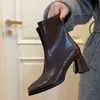 Botines de tacón alto estilo europeo y americano para mujer, nuevos botines slim retro franceses para otoño e invierno 2026, versátiles botas estilo Dr. Martens con tacón grueso