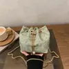 Bolsas Femininas de Comércio Exterior 2026 Novo Estilo de Alta Qualidade com Franja de Metal Lantejoulas Bolsa de Festa Bolsa Balde de Luxo Leve Bolsa Transversal