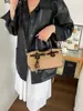Bolsa colgante de adorno con estampado de leopardo miu de alta gama para mujer, nuevo estilo 2026, bolso de mano retro de un solo hombro, bolso cruzado versátil para el trabajo