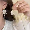 Brincos Clip-on de Espiral para Mosquitos Transfronteiriços para Mulheres Sem Piercings, Brincos de Nicho High-End, Brincos Retrô de Celebridade da Internet para Rostos Quadrados e Redondos, Acessórios de Orelha