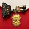 Ano do Carneiro: Uma coleção de chaveiros banhados a ouro, com fofos designs de ovelhas em desenho animado, perfeitos como presente de Ano Novo ou acessório para sua bolsa.