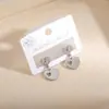 Pendientes de Aro Creativos Huecos de Amor Nuevos Más Vendidos Transfronterizos Europeos y Americanos para Mujer, Joyería de Oreja Personalizada Exquisita y de Moda al por Mayor