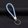 Joyería Tejida Creativa Llavero de Cuerda de Cuero Colgante para Coche Llavero de Cuerda de PU para Pareja Pequeño Regalo Fabricante Bolsa