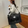 Nueva bolsa de viaje portátil para mujer, venta al por mayor transfronteriza, bolsa de natación y fitness con separación de humedad y secado seco para negocios de corta distancia, bolsa de almacenamiento cruzada.