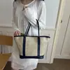 Bolso casual de moda personalizado de gran capacidad para mujer, nuevo bolso de hombro de verano 2026, bolso tote de diseño de nicho moderno