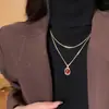 Cadena para clavícula de doble capa superpuesta con piedra de ámbar color rojo vino de alto valor, lujo ligero, nicho, todo para combinar, cadena para el cuello con diseño para mujer