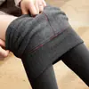 Leggings adelgazantes acanalados de rayas verticales 2025 Pantalones cálidos gruesos de invierno tipo cachemira con forro polar y pantimedias de algodón de alta elasticidad